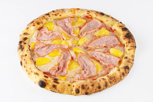 istock Hawaiian Pizza with Ham and Pineapple on White Background 2231322582