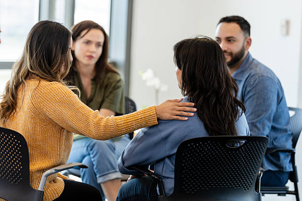 istock Supportive Group Therapy Session: Women Offering Emotional Support 2231325782