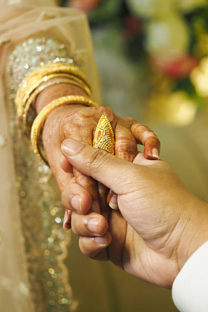 istock Hands joined in a beautiful wedding ceremony moment 2231333955