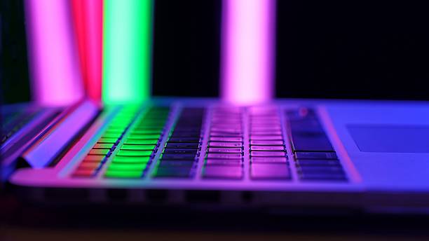 Vivid Colorful Lights Reflecting on Laptop Keyboard