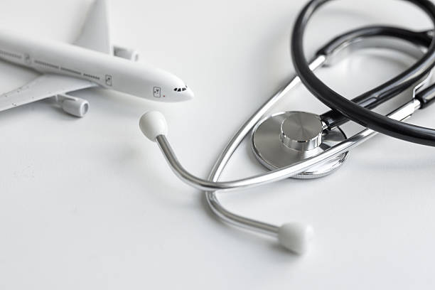 istock Plane model and medical stethoscope 2231345179