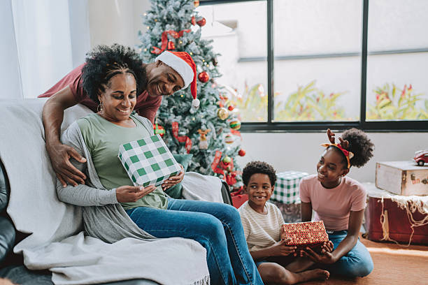istock Christmas gift family celebrating 2231348890