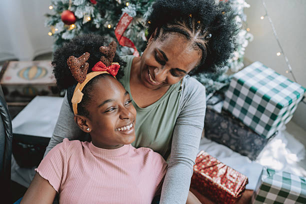 istock mother christmas gift for daughter 2231348896