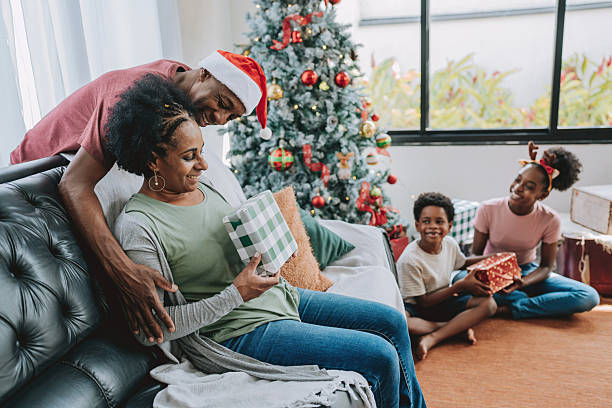 istock Christmas gift family celebrating 2231348909