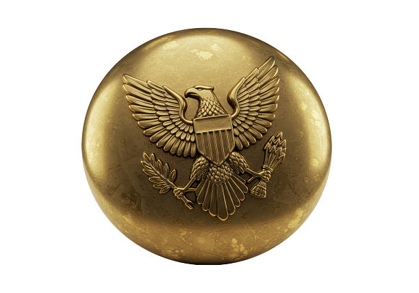 istock Isolated Gold Button with American Eagle Emblem in Detailed Relief 2231353370