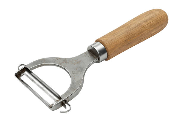 istock Isolated Vintage Vegetable Peeler with Wooden Handle 2231354495