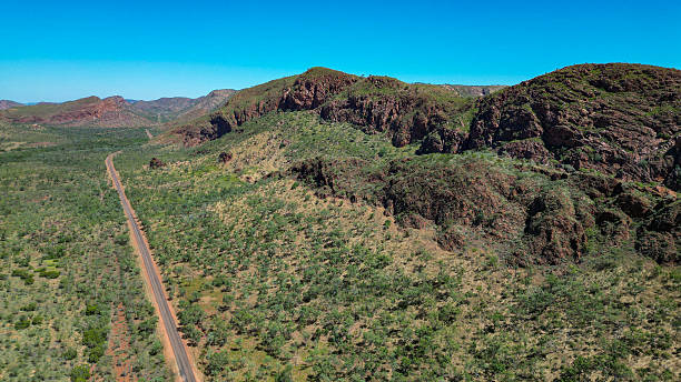istock Lake Argyle, the river that flows from it, and its surrounding mountains, Western Australia seen from above 2231357755