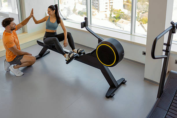 istock Personal Trainer Supporting Female Athlete During Workout 2231360973