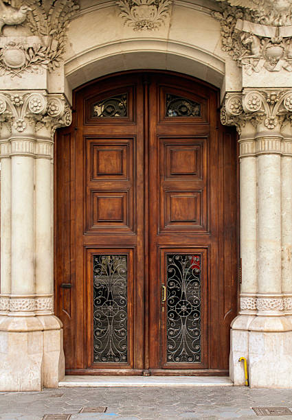 istock Double Panelled Doors with Ornate Glass Inserts in Barcelona, Spain. 2231368432