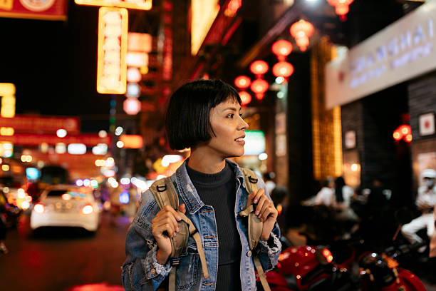 istock Young tourist exploring vibrant chinatown at night 2231377832