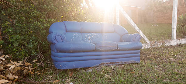 Sofa left on the meadow