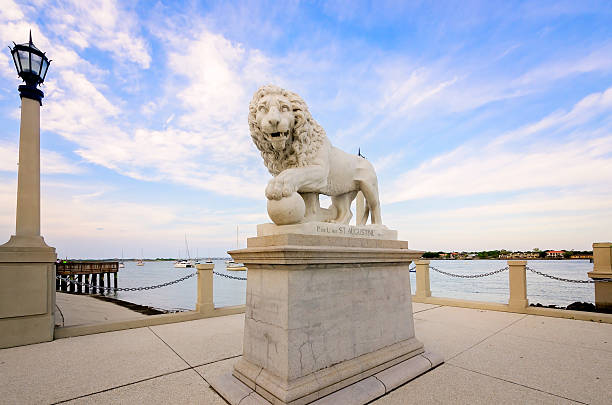 St. Augustine, Florida, USA - April 10, 2015: The Bridge of Lions is pictured in St. Augustine, Florida. The Bridge of Lions is listed on the National Register of Historic Places. The lions were sculpted by Romanelli Studios in 1927. They are replicas of the Medici lions, which date back to the second century AD.