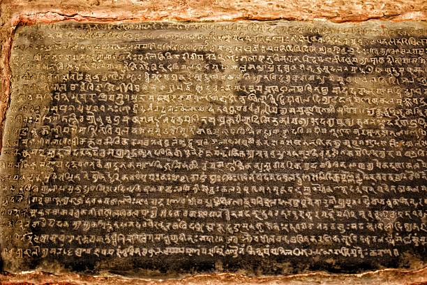 istock Ancient stone inscription, document recording in ancient times, historical background 2231385426