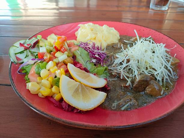istock A Colorful Plate of Beef Stew with Mashed Potatoes and Salad 2231397158