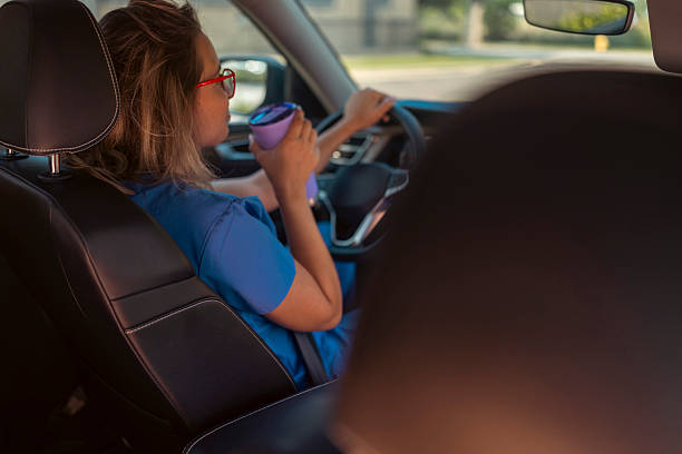 istock Nurse drinking coffee on her way to work 2231399854