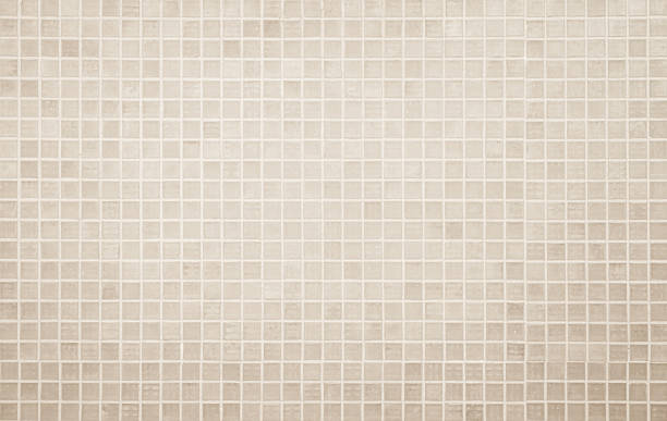 istock Cream light ceramic wall and floor tiles mosaic background. Simple seamless abstract surface clean. 2231399904