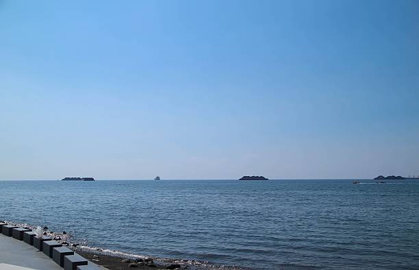 istock Beautiful and calm beach view with blue sky 2231402264