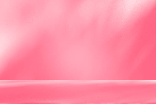 istock Wall interior background, studio, and backdrops show products. with shadow from window color white and pink light. background for text insertion and presentation of product 2231402294