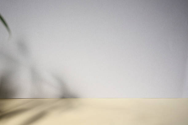 istock minimal paper background with shadows and lights 2231404101