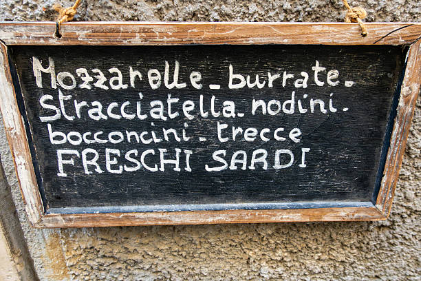 Cagliari, Sardinia, Italy A blackboard menu in  Italian offers burrate, mozzarella, freshi sardi, and other items.