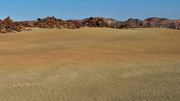 istock This stunning desert landscape features impressive rock formations set beneath a clear blue sky 2231409018