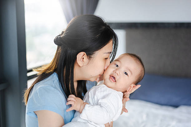 istock The Peace of Morning: A Mother and Son Share Their First Moments 2231413249
