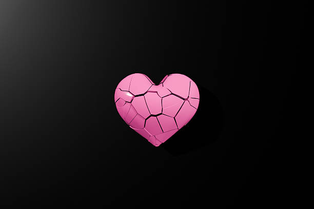 istock A pink heart mark that is beginning to break 2231419172