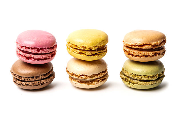 istock Small colorful tasty sweet original classic macaroons cakes isolated on white studio background 2231423055