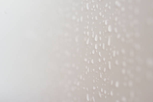 Raindrops on the glass. Raindrops on the window. Abstract background.