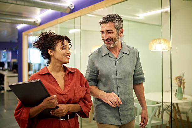 istock Friendly coworkers enjoying onsite connection 2231429983