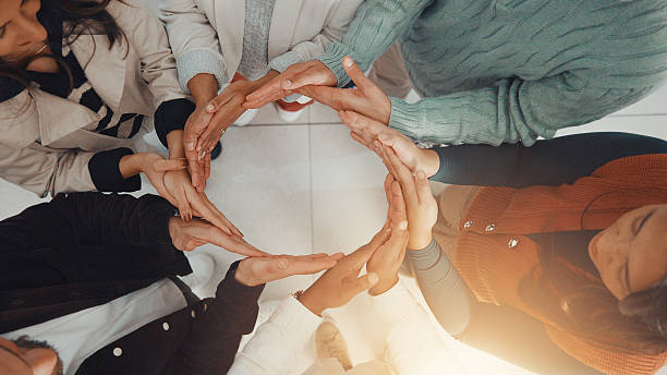 istock Business people, hands circle and above for teamwork, support or collaboration with goals. Employees, group and together with connection for mission, target and staff synergy for unity or partnership 2231431341
