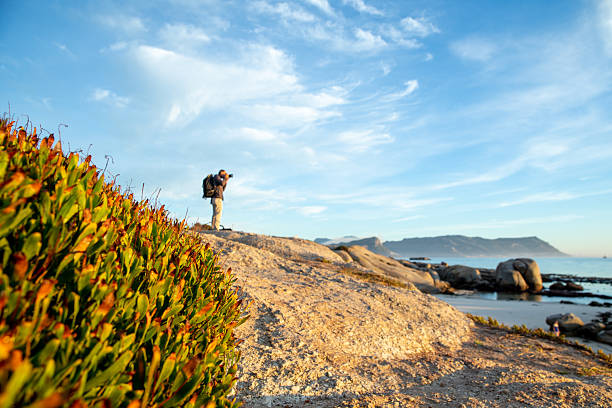 Photographer on the Boulders beach rock