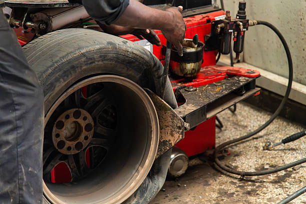 istock repairing vehicle wheel 2231435864