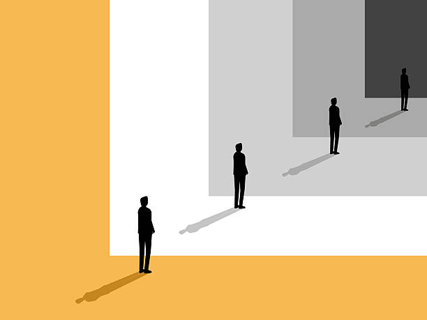 istock Businessman standing looking at his reflection in the mirror 2231436060