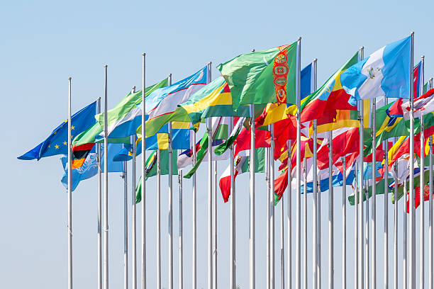 istock Lots of world's countries national flags waving on wind, 2231438321