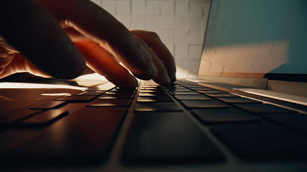 istock Closeup worker fingers typing keyboard laptop making online research working 2231442683