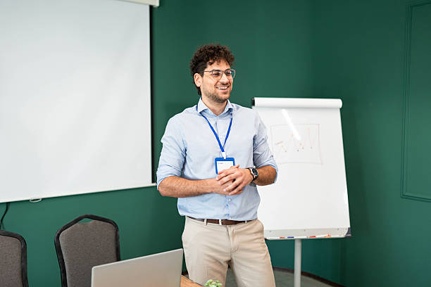 istock Confident Businessman Leading Corporate Presentation 2231443895