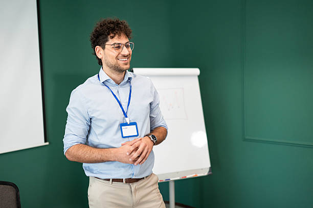 istock Confident Businessman Leading Corporate Presentation 2231443898