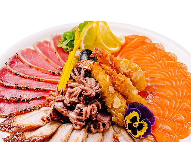 Colorful platter of assorted seafood with vibrant garnishes and textures