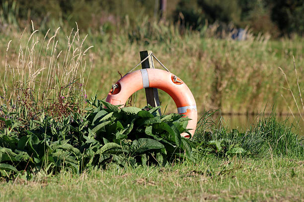 Life preserver floatation device situated at an inland lakeside location