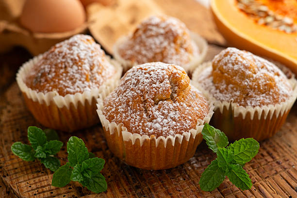 istock Pumpkin  Muffins. A traditional fall recipe with fresh pumpkin, eggs, and flour. 2231451246