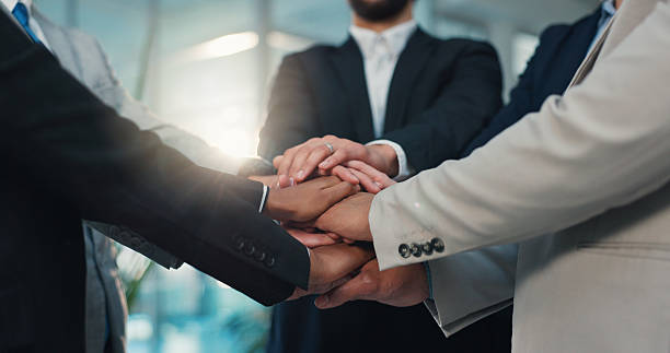 istock Hands, stack and business people with teamwork, support or corporate collaboration. Together, solidarity and group of workers with cooperation for goal, motivation and target with synergy in office 2231454033
