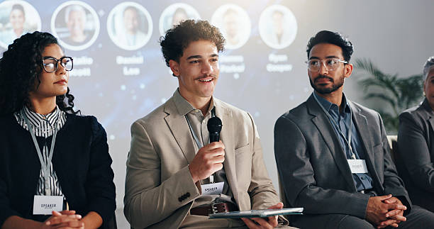 istock Conference, speaker and panel of people on a stage for discussion, seminar faq and presentation. Business summit, entrepreneurship expo and men with women with mic for tradeshow, event and convention 2231457606