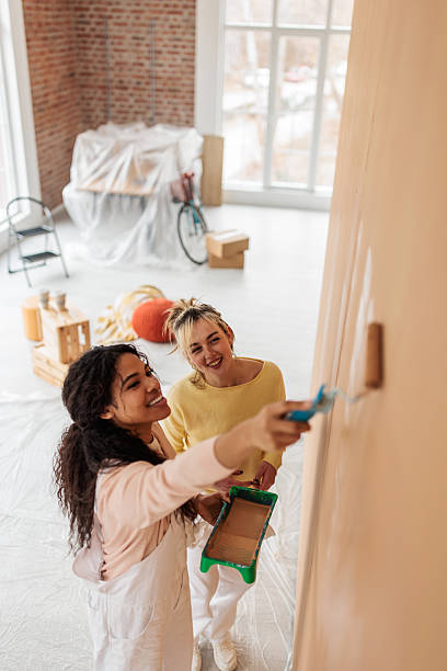 istock Creative Women Transforming Home Walls 2231458754