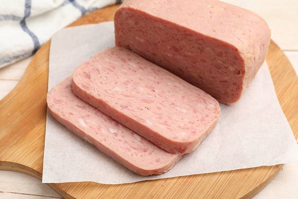 istock Tasty canned meat on light table, closeup 2231466183