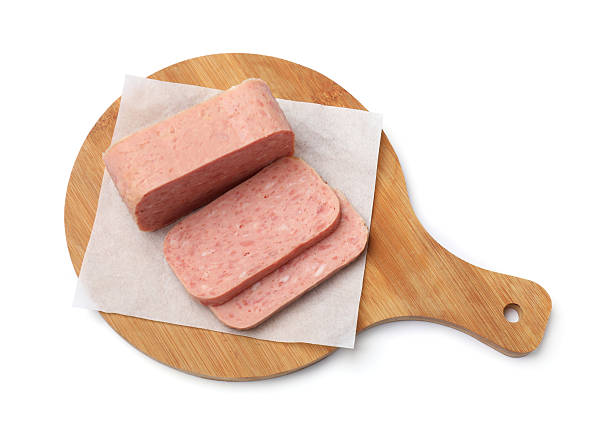 istock Tasty fresh canned meat isolated on white, top view 2231466357