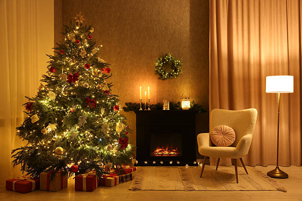 istock Cozy room with Christmas tree, fireplace and armchair. Interior design for holiday 2231469578