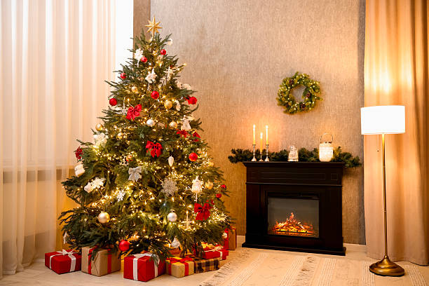 istock Cozy room with Christmas tree, fireplace and lamp. Festive interior design 2231469583
