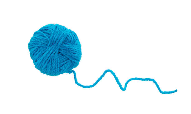 istock Ball of yarn isolated on white. 2231479481