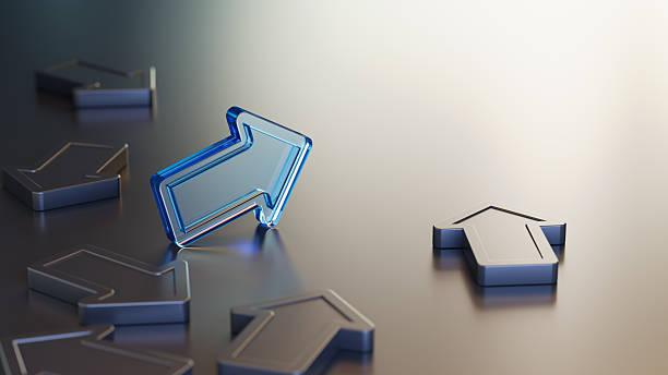 Blue transparent arrow standing out among metallic ones on a reflective surface symbolizes guidance, leadership, and standing out. A modern, futuristic concept illustration suitable for business or strategy themes.